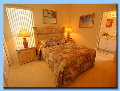 The second master suite in the Villa has a large queen size bed.