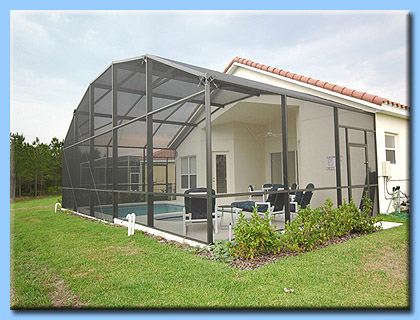 Outside the luxury villa, looking at the pool area.